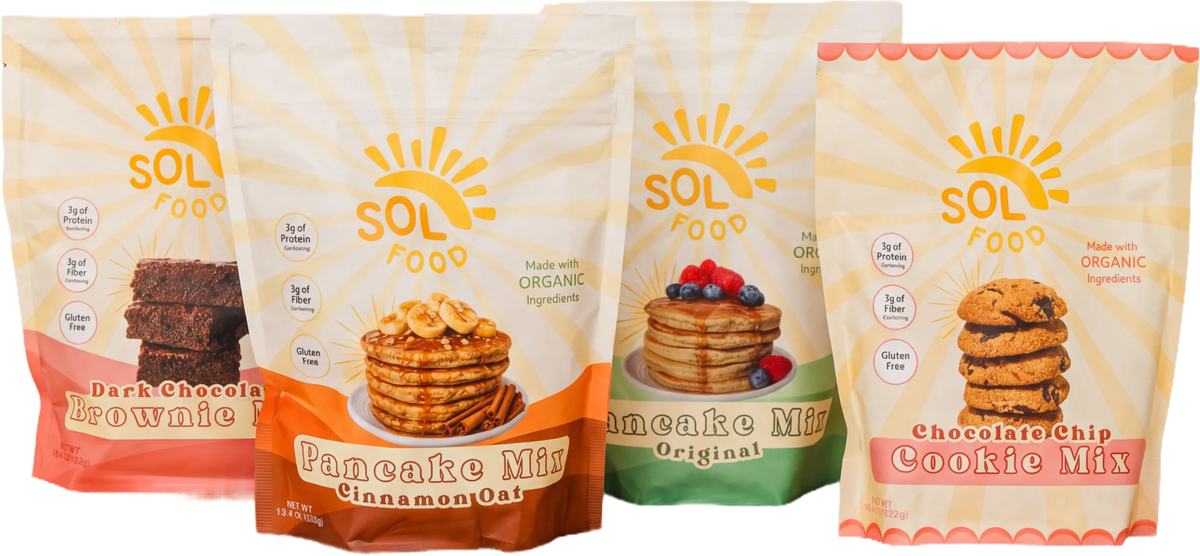Sol Food Dark Chocolate Brownie, Cinnamon Oat Pancake, Original Pancake, and Chocolate Chip Cookie mix bags